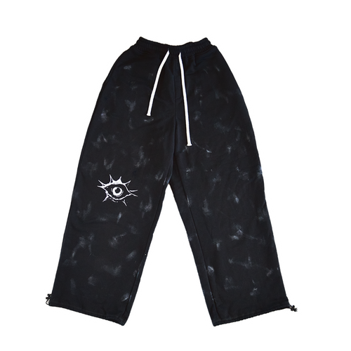 Black Trips streetwear sweatpants, oversized baggy fit, made of heavy-weight 500 gsm organic cotton with manual faded spray treatment.